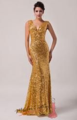 Zlaté šaty s flitry.
